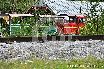 Railway in the Open-air museum with old farmhouses and buildings in GroÃŸgmain in Salzburg, Austria, Europe Editorial Stock Photo